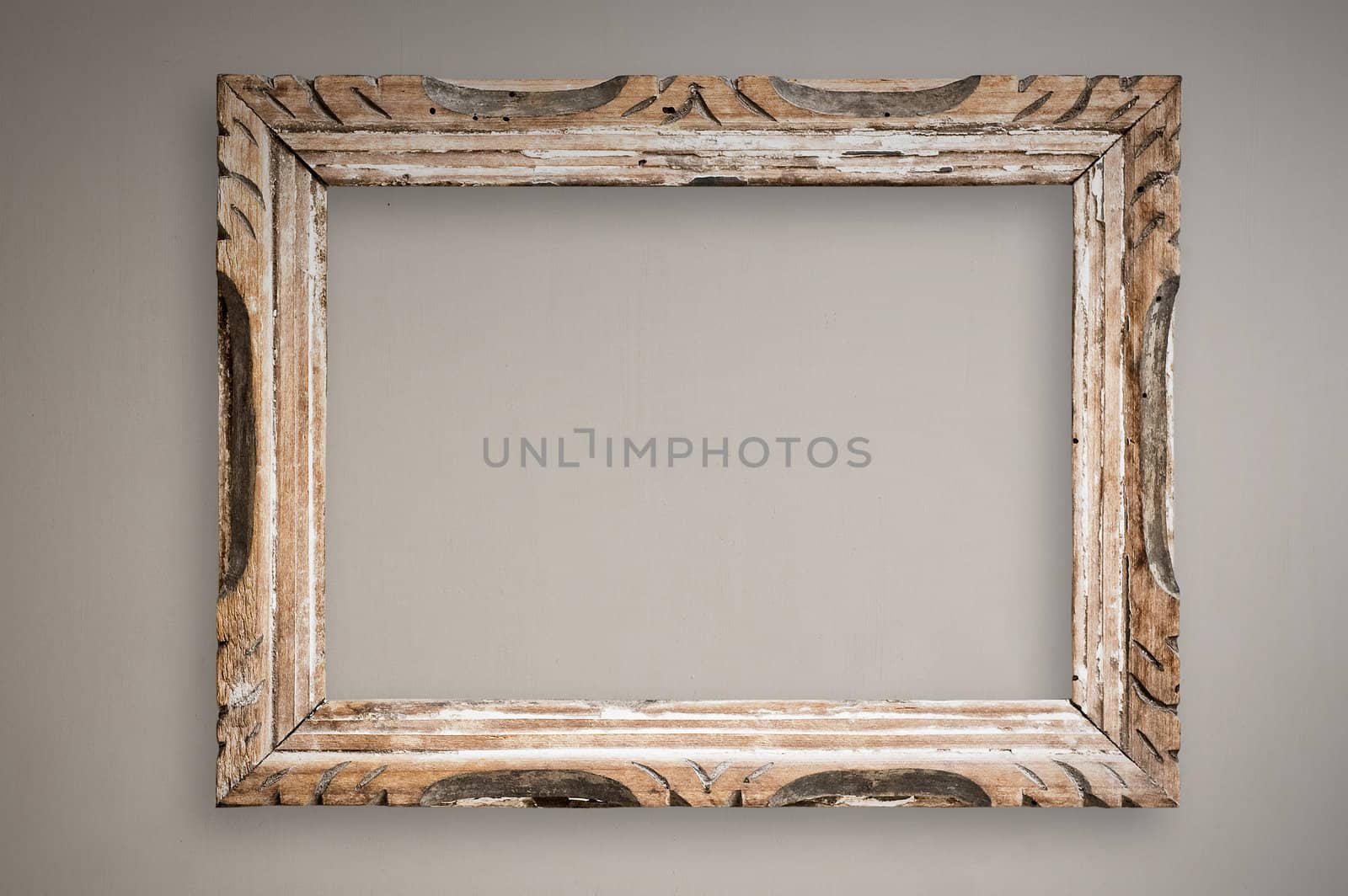 Vintage picture frame hanging on wall, clipping path.