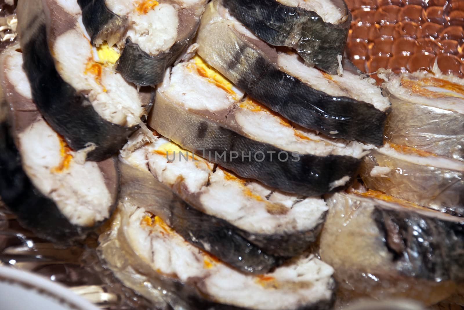 Fresh tasty fish dish cut into wedges