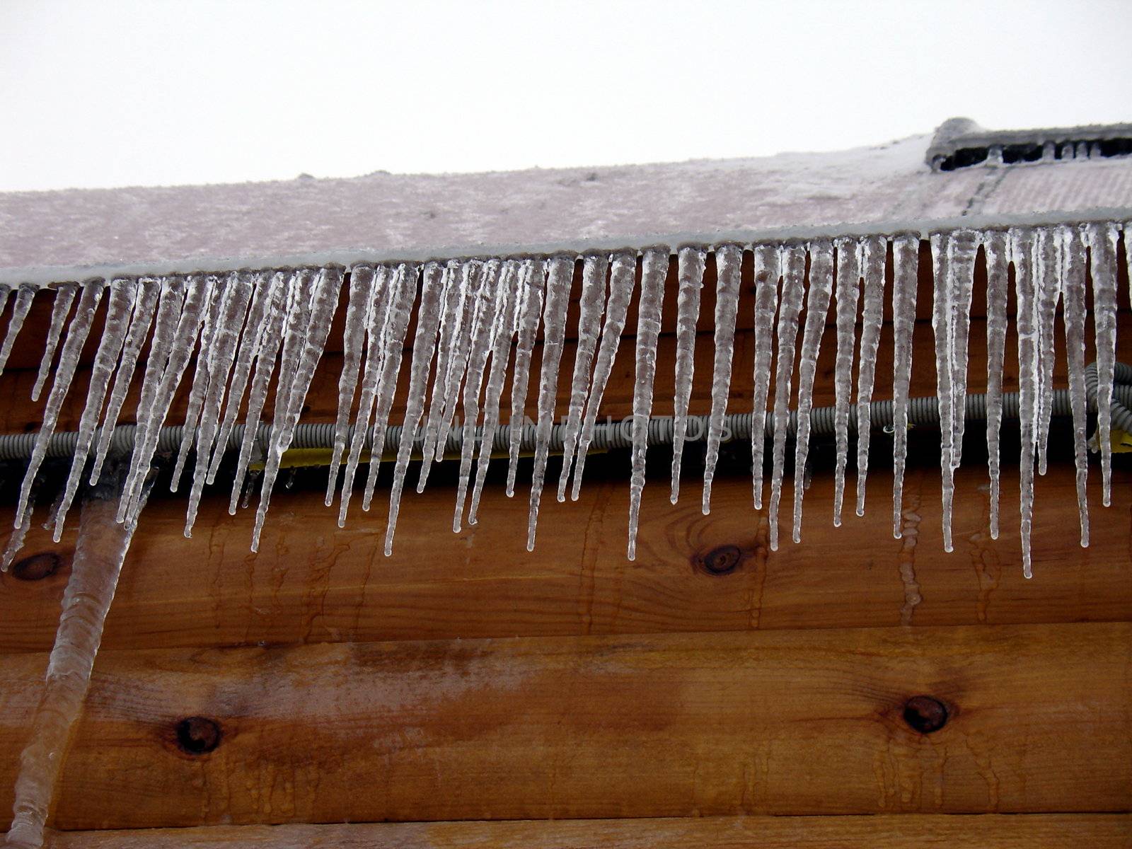 Roof with a lot of long icicles