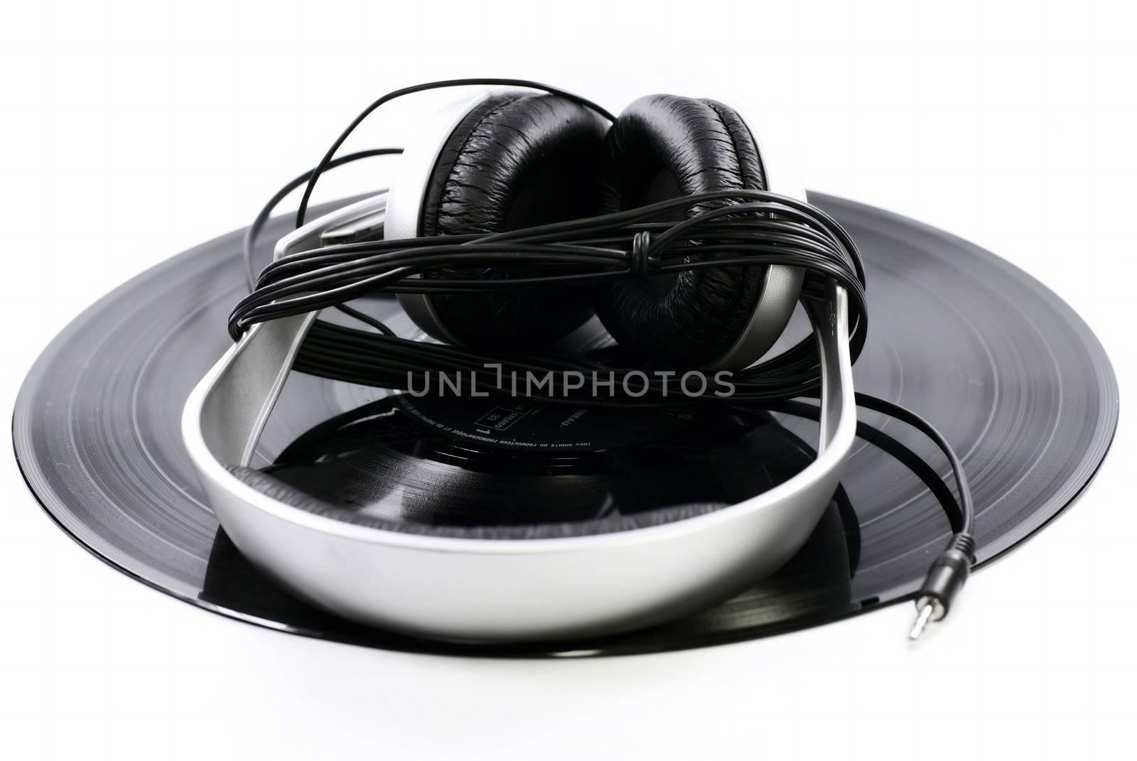 a headphone on a vinyl record