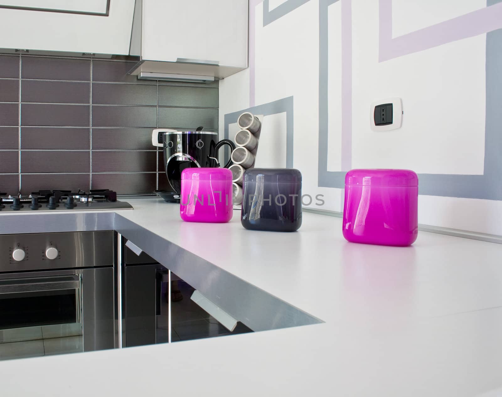 Fuchsia Plastic bowls on white kitchen