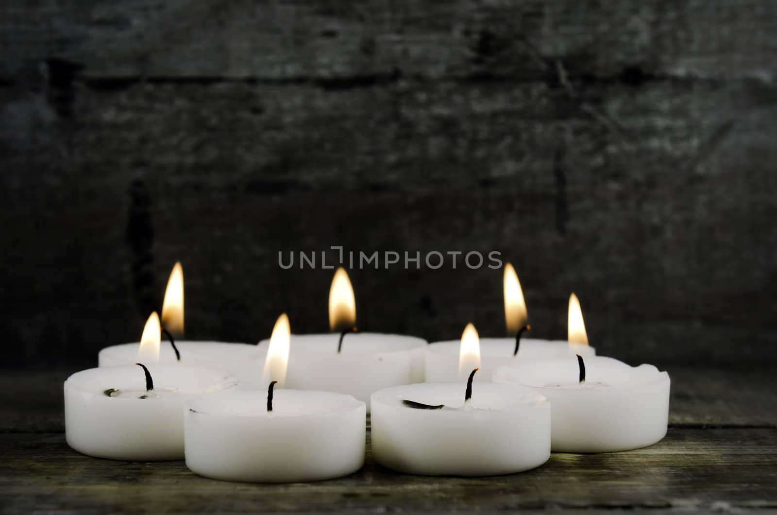 white candle in circle