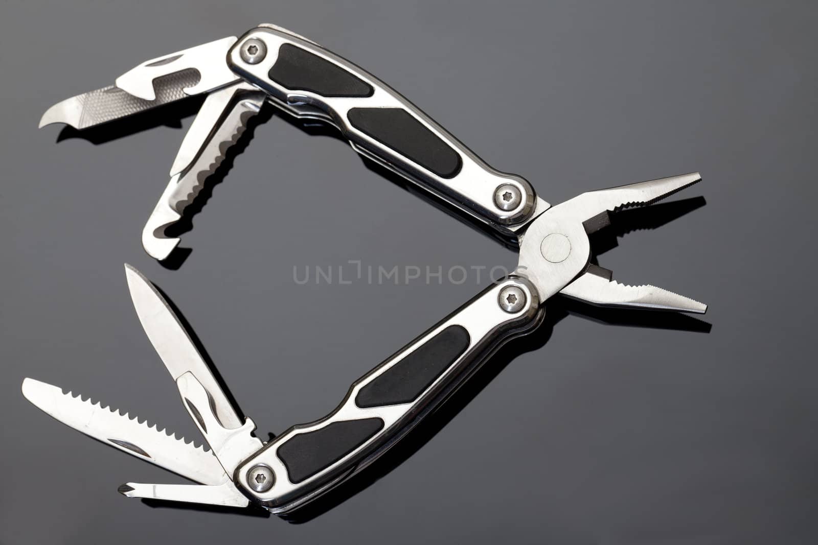 Steel pliers folding multi tool opened by Discovod