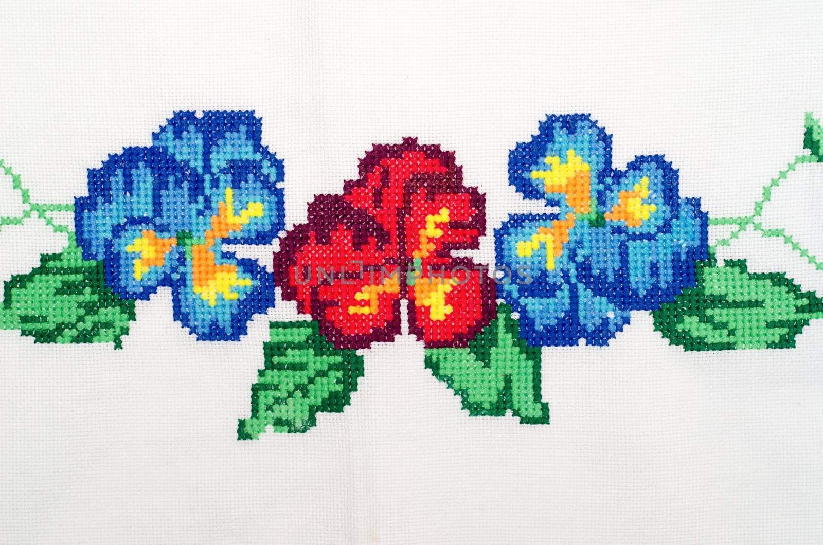 embroidered good by cross-stitch pattern. ukrainian ethnic ornament