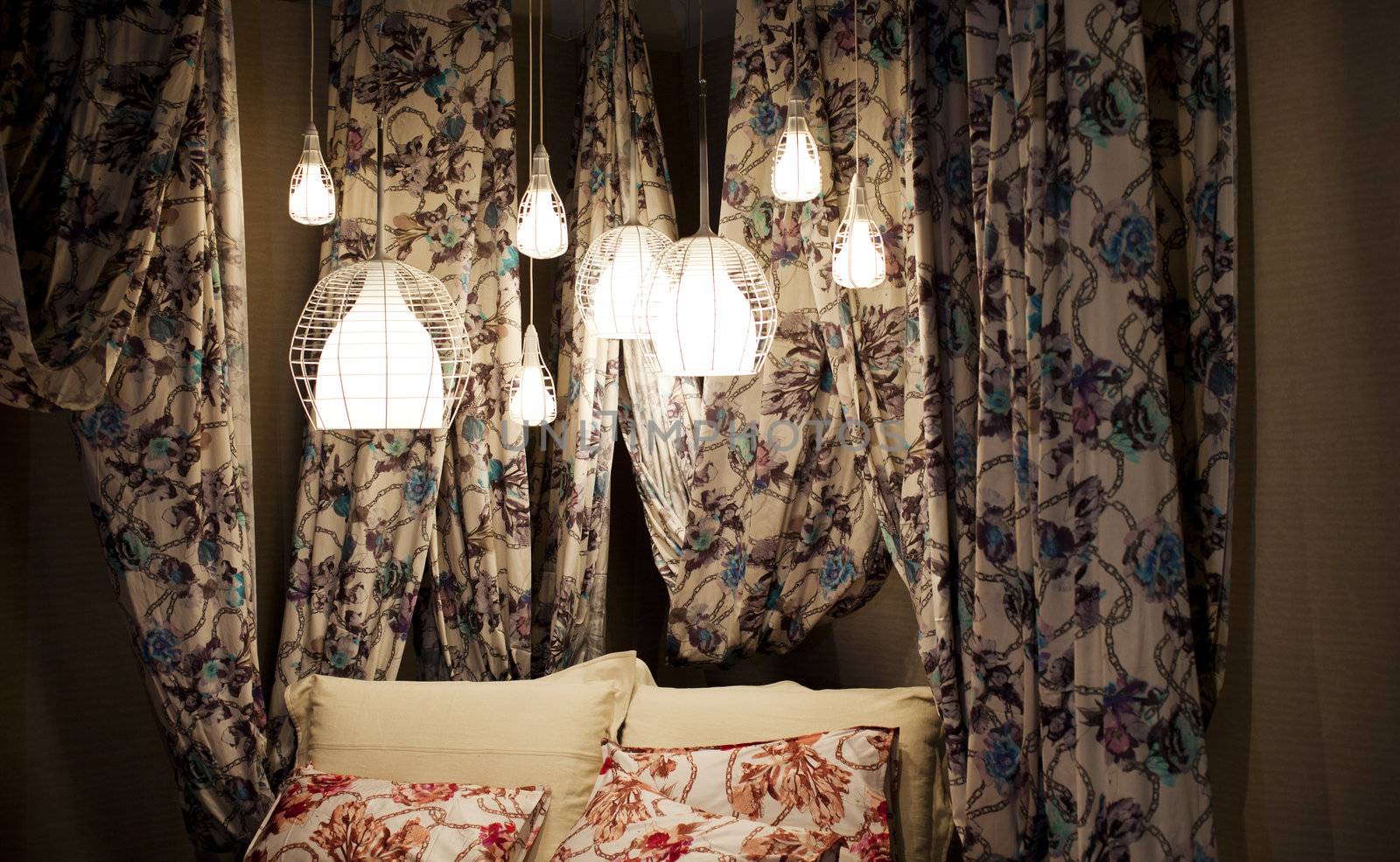 Canopy bed with floral curtains