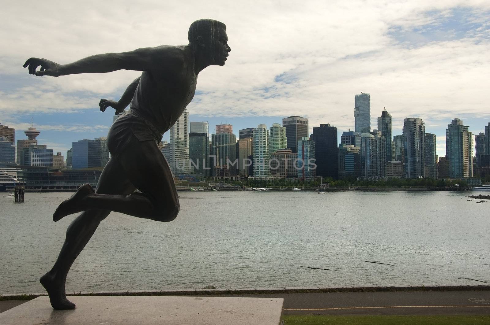 monument to man running on the background of high-rise buildings in Vancouver, Canada







statue of a running man