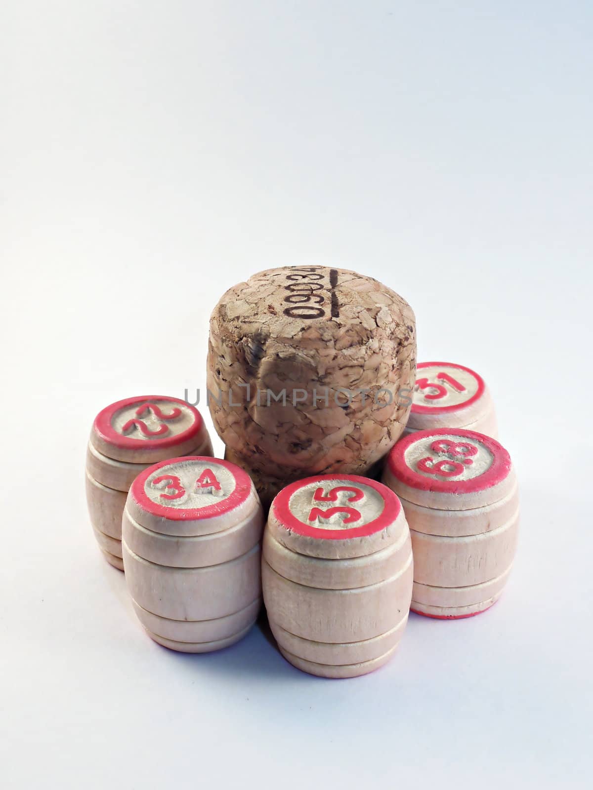 Small kegs with red numbers and Brown cork isolated on white background
