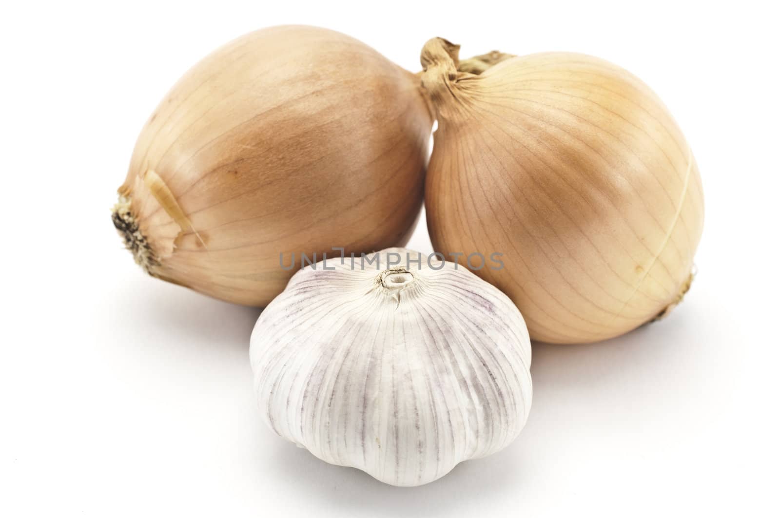 Garlic and onions on a white background