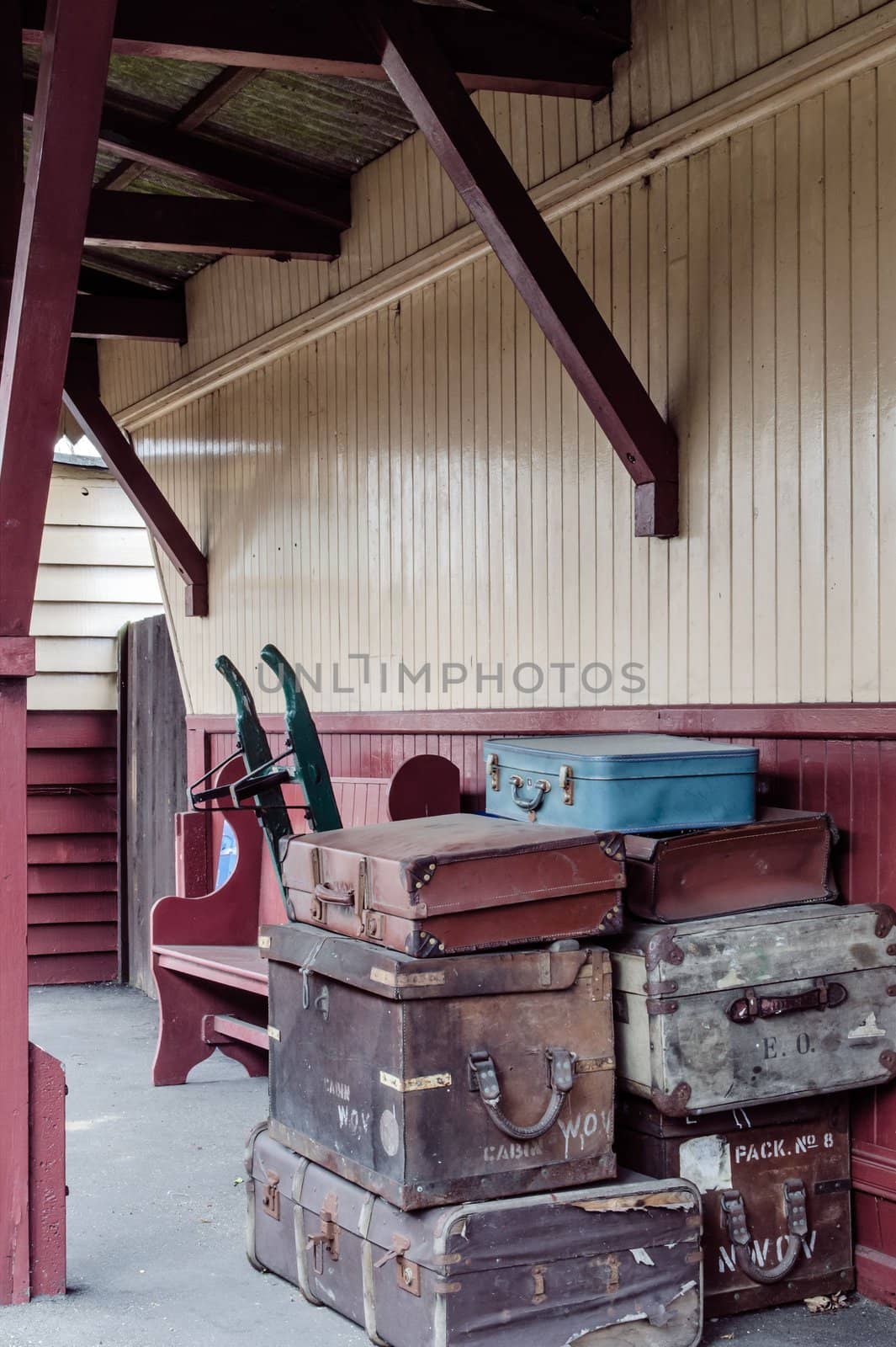 Old style luggage on railway platform