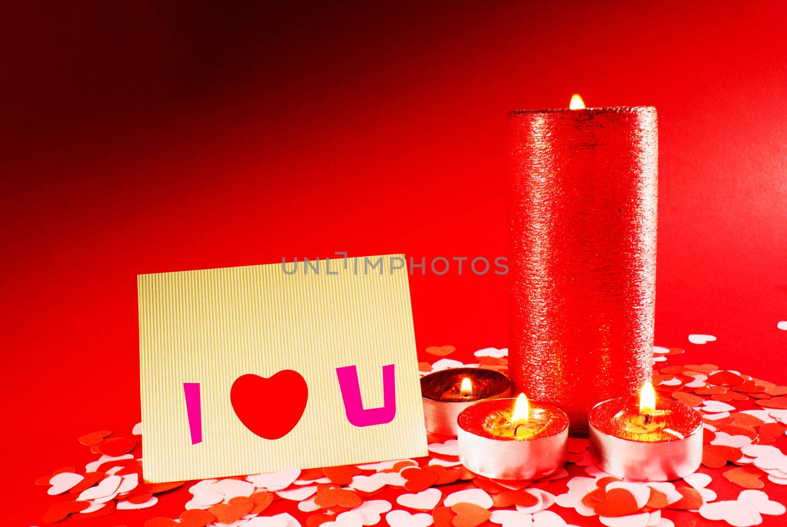 St. Valentine's day greeting background with four burning candles