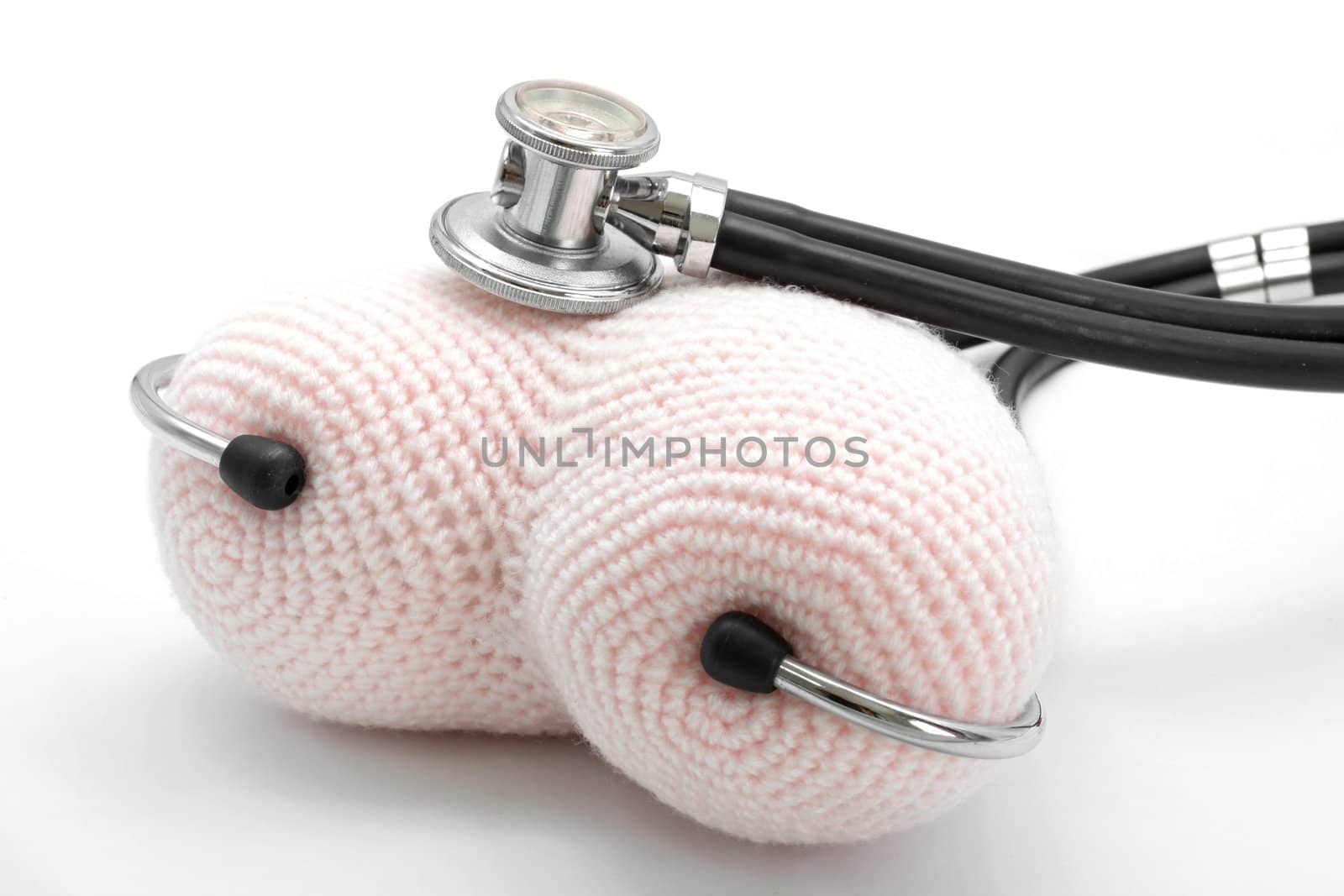 Perspective of Stethoscope and Heart on White Background using as Valentine Love Concept