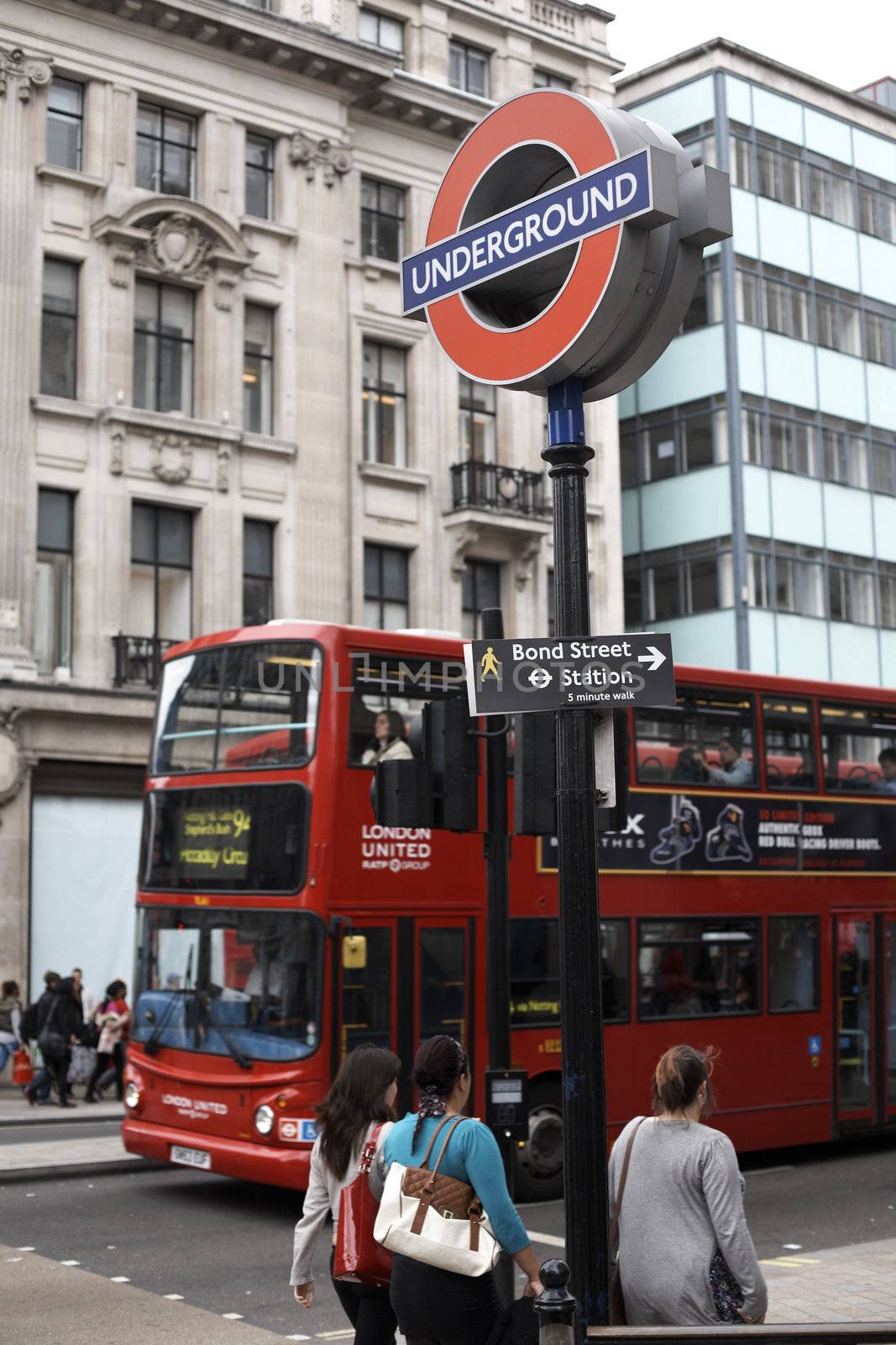 London, England - 08 Sep, 2011: Iconic London Underground station sign against the double decker bus

Iconic London Underground station sign against Big Ben clock tower at the Houses of Parliament in Central Londo