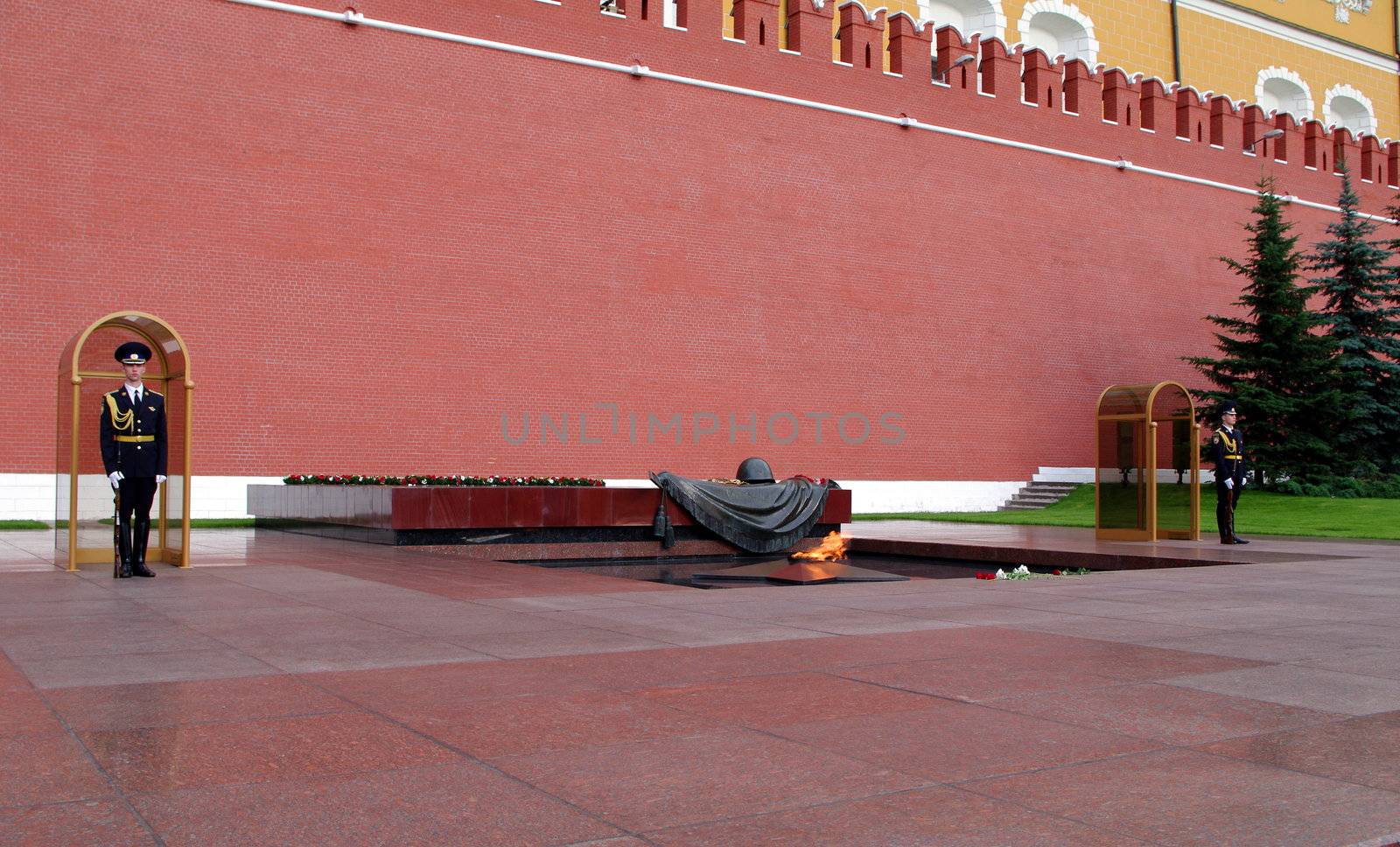 Moscow, Russia - June 14, 2010: Summer day. Soldiers near the eternal fire on June 14, 2010 in Alexandrovski garden, Moscow kremlin, Russia by Stoyanov