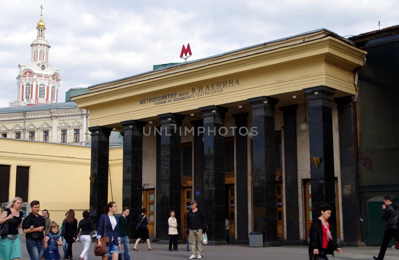 Moscow, Russia - June 14, 2010: Summer day. Peoples walk near the entrance of Teatral'naya metro station on June 14, 2010 in Moscow, Russia