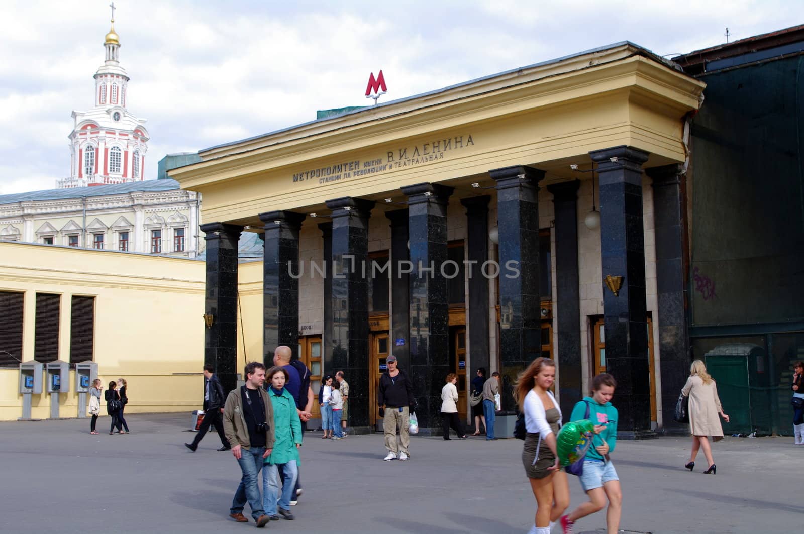 Moscow, Russia - June 14, 2010: Summer day. Peoples walk near the entrance of Teatral'naya metro station on June 14, 2010 in Moscow, Russia