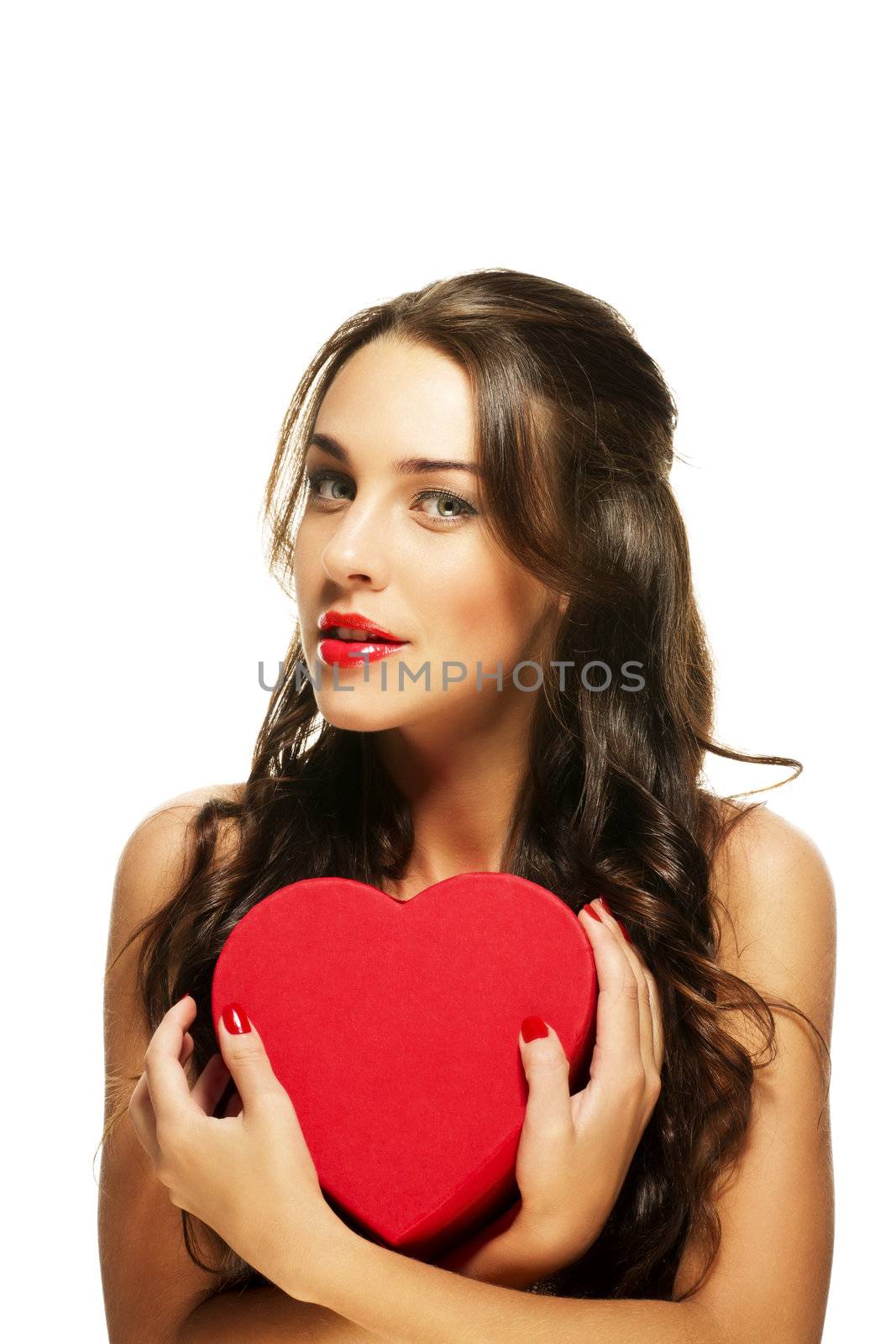 beautiful woman with red lipstick holding red heart on white background