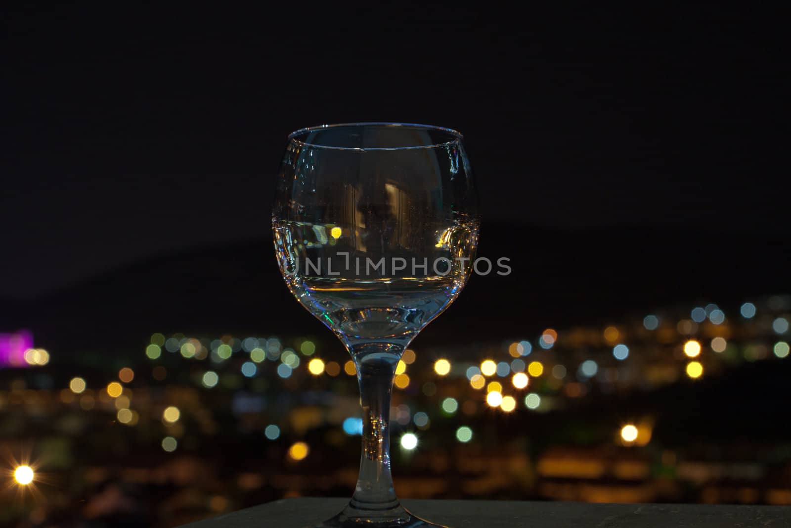 glass in front of defocused lights 