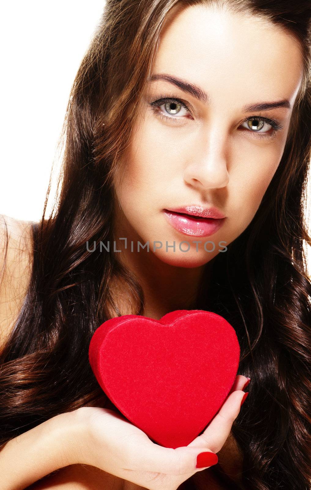 cute brunette woman holding red heart on white background