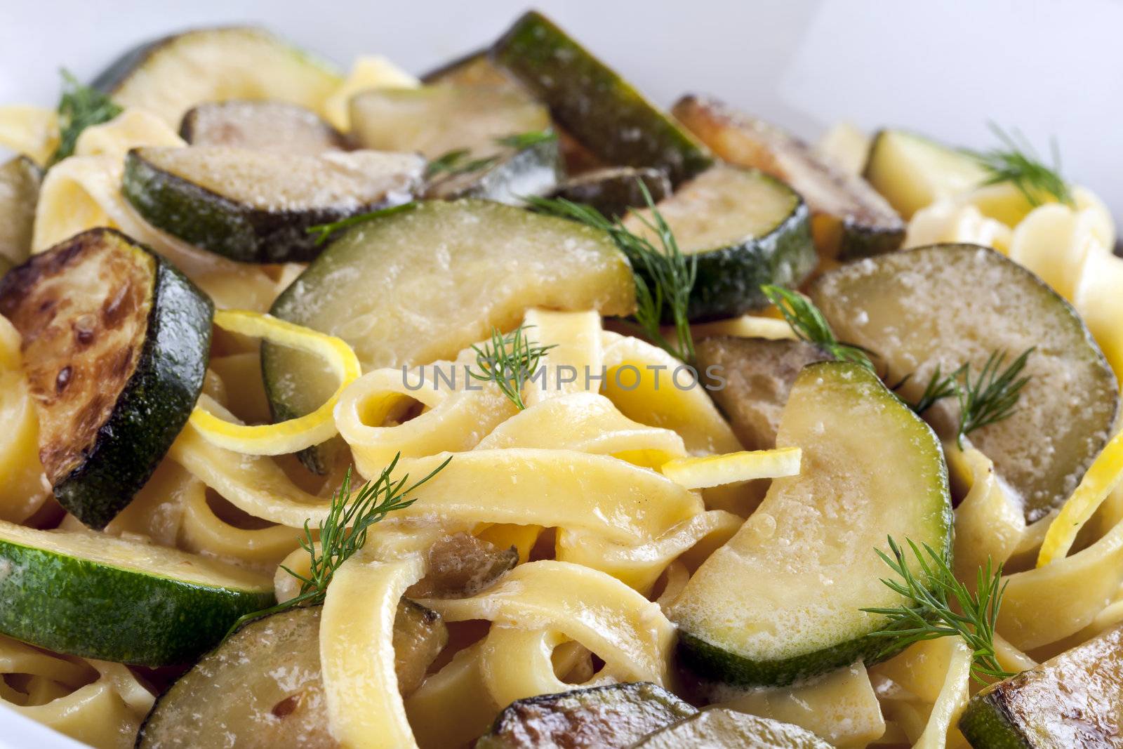 Vegetarian pasat with zucchini and dill lemon sauce.