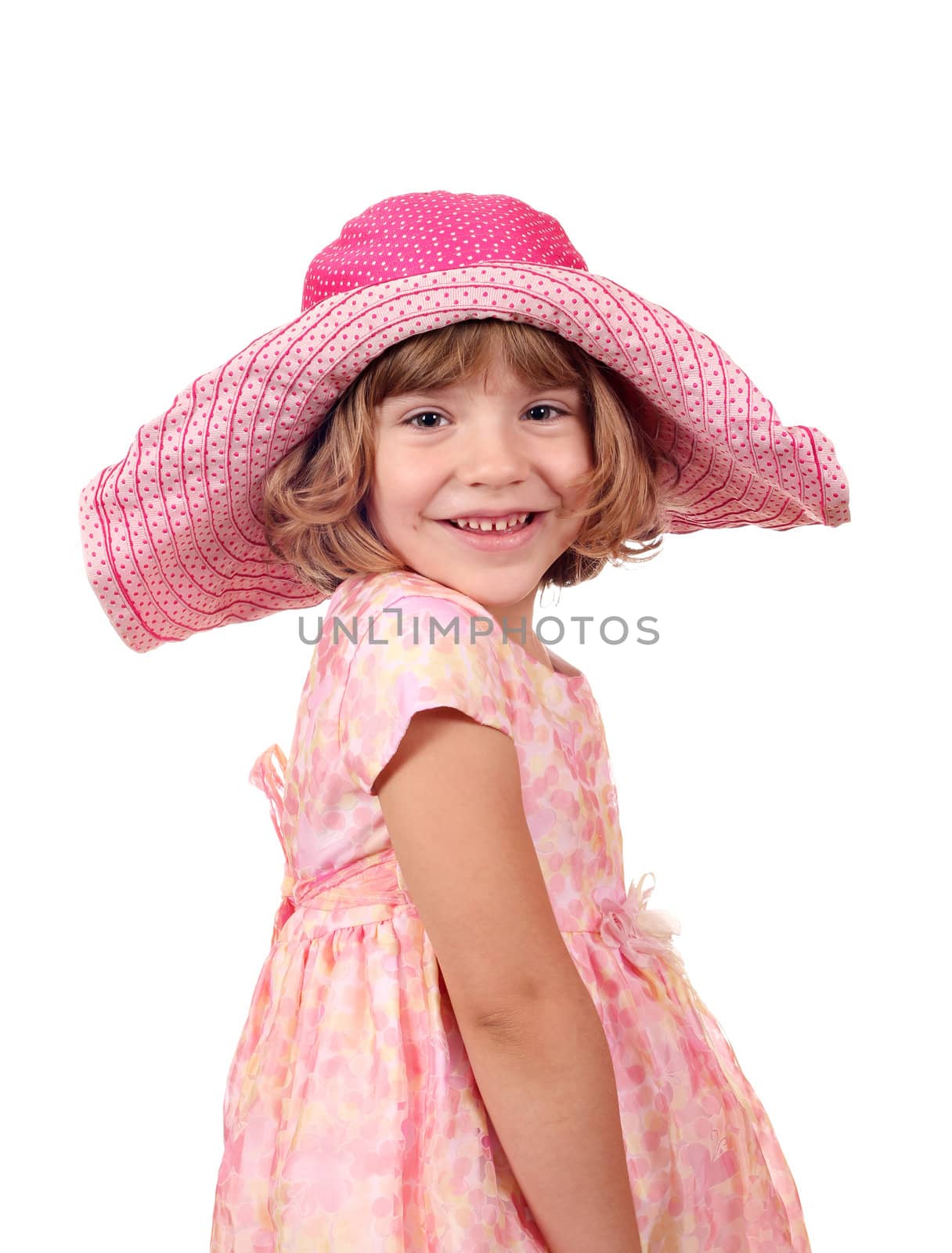 happy little girl with big hat and dress on white 