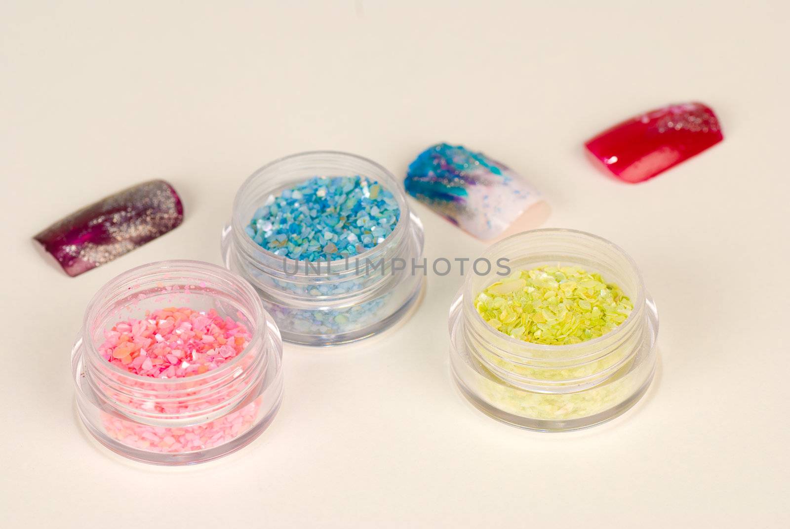 Glitter as used for nail  art wit some finished samples