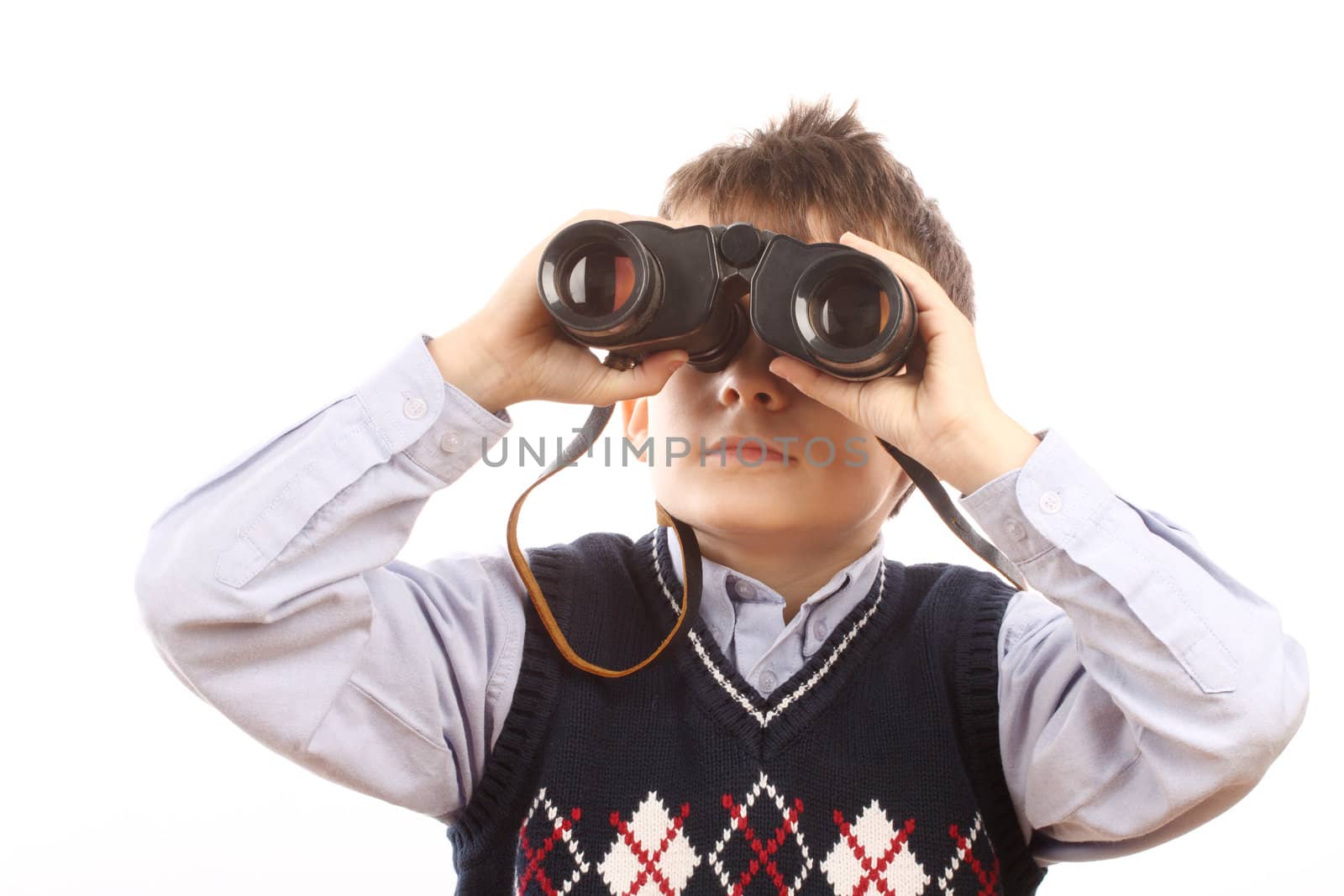 Boy look through the binoculars over white