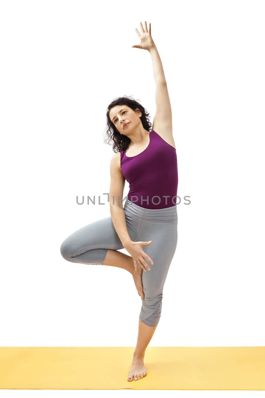 An image of a pretty woman doing yoga