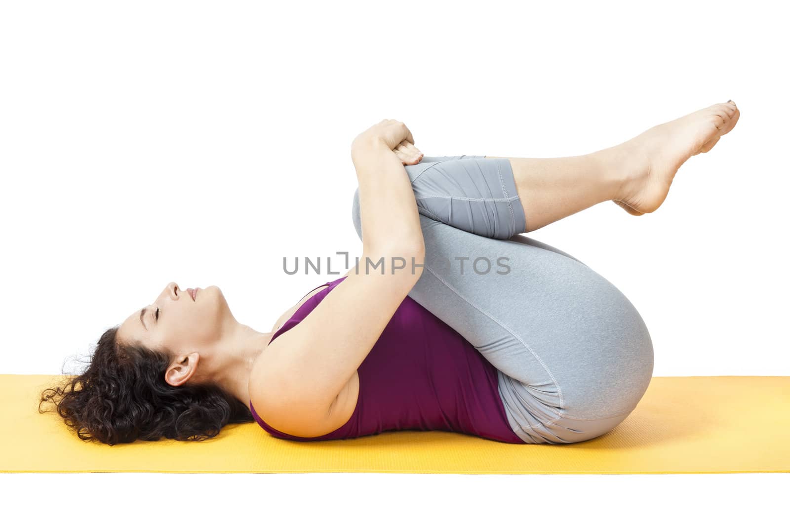 An image of a pretty woman doing yoga