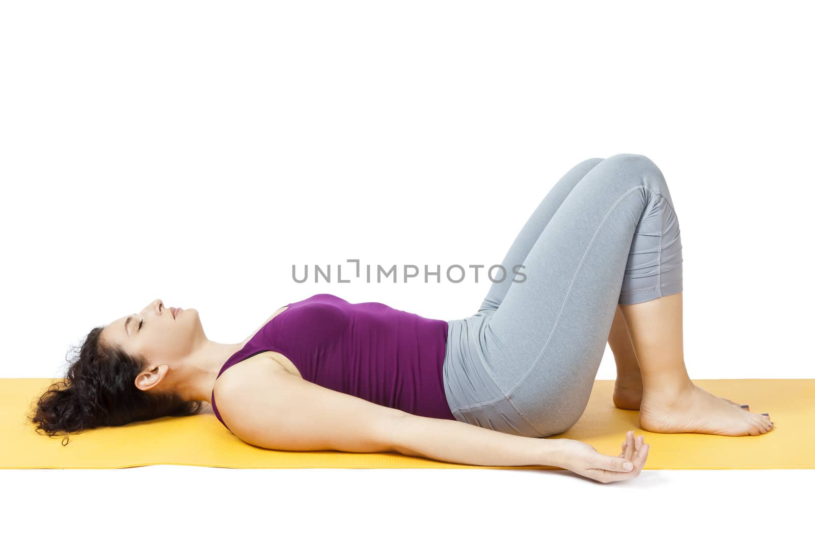 An image of a pretty woman doing yoga