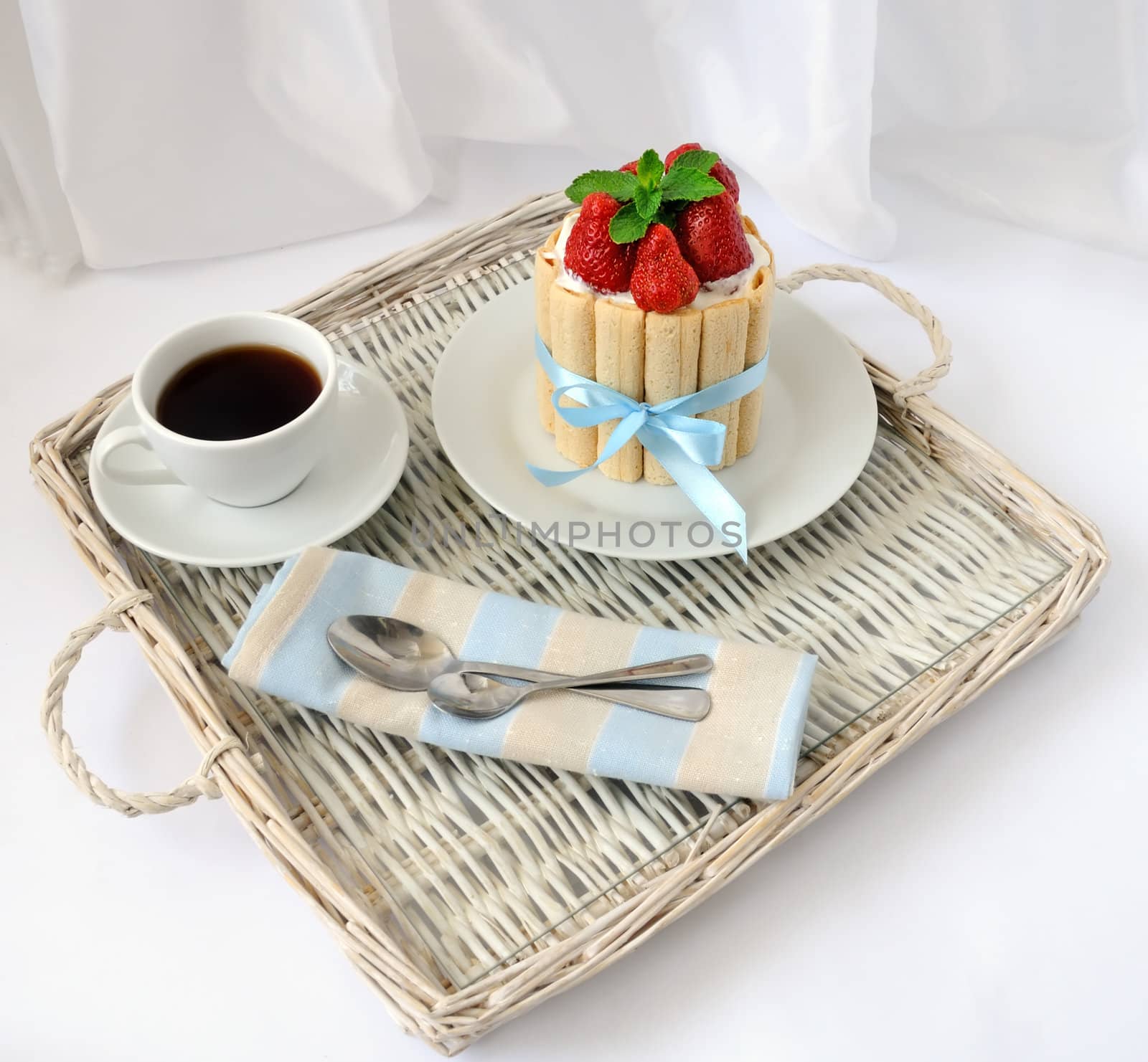 Dessert souffle with biscuit and fresh strawberries and a cup of by Apolonia