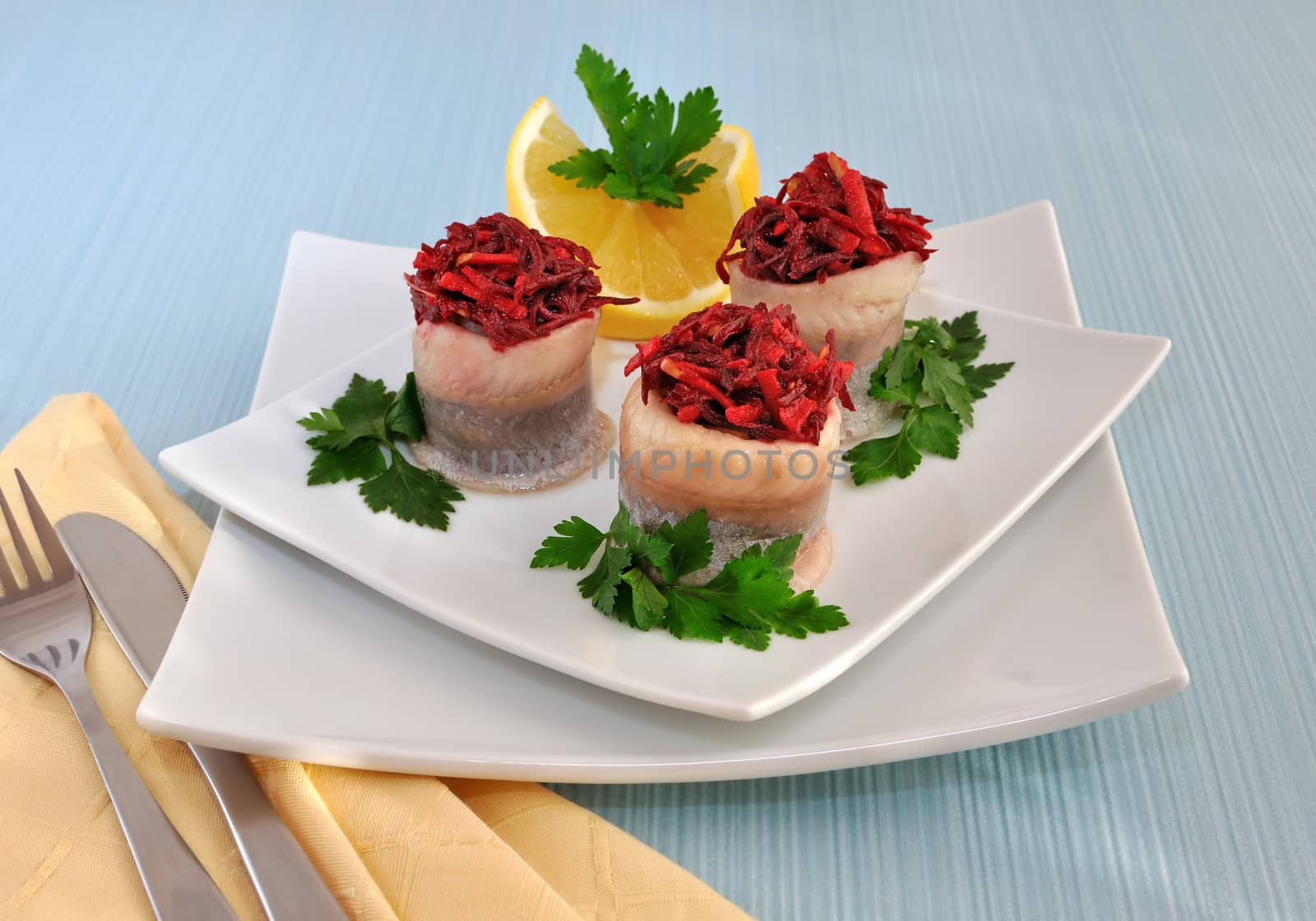 Rolls of herring with beetroot, apple stuffing by Apolonia