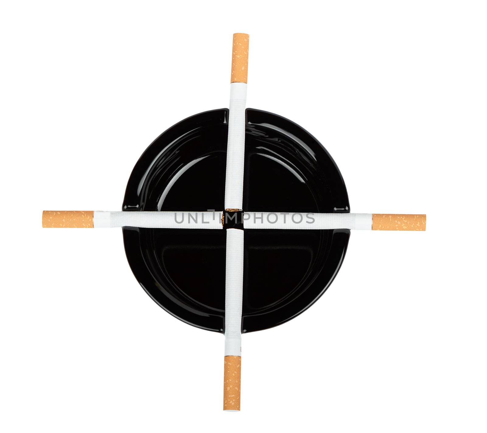 Cigarettes are a black ashtray on a white background