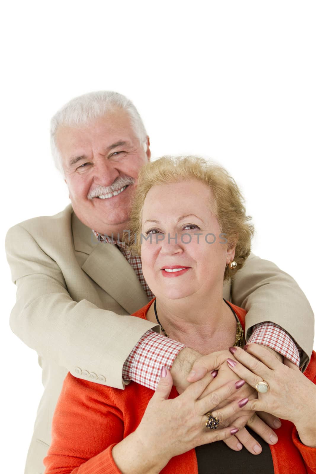 Older couple showing love each other by holding eachother hands. Man behind the women. Both of them happly smiling happily. Great valentines. Isolated on white.