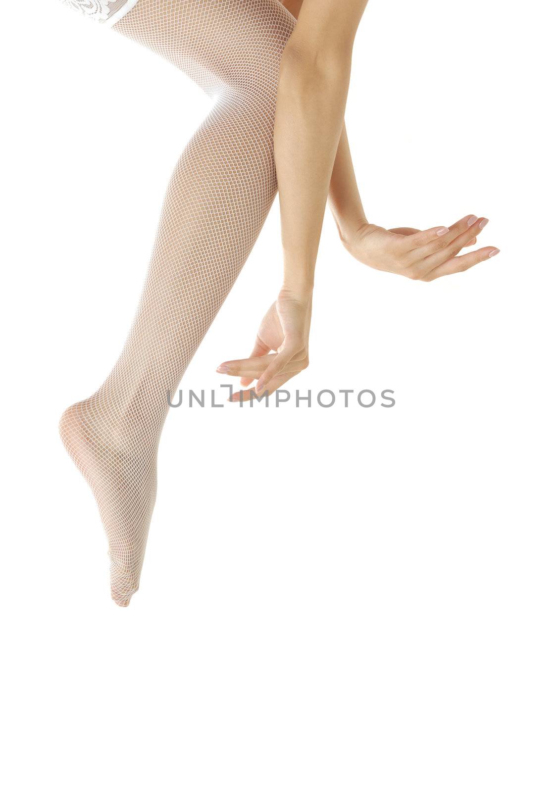 Close-up photo of the woman legs and hands dancing
