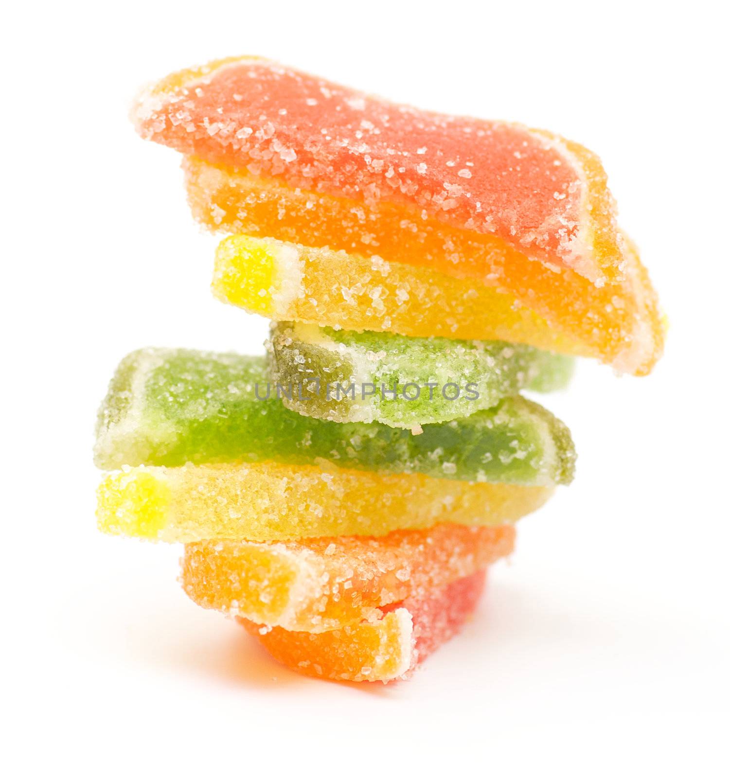 Multi colored fruit candy on white background