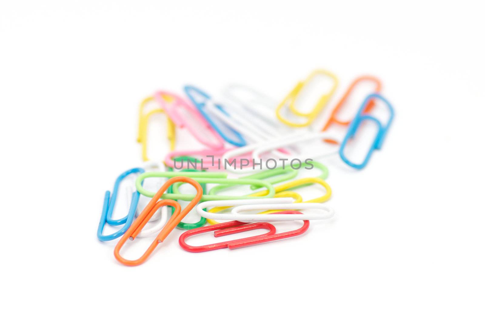 Multi colored paper clips on white background







Paper clips