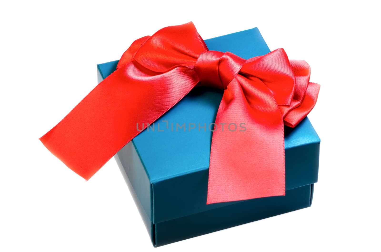 Gift box with a red ribbon bow isolated on white background.