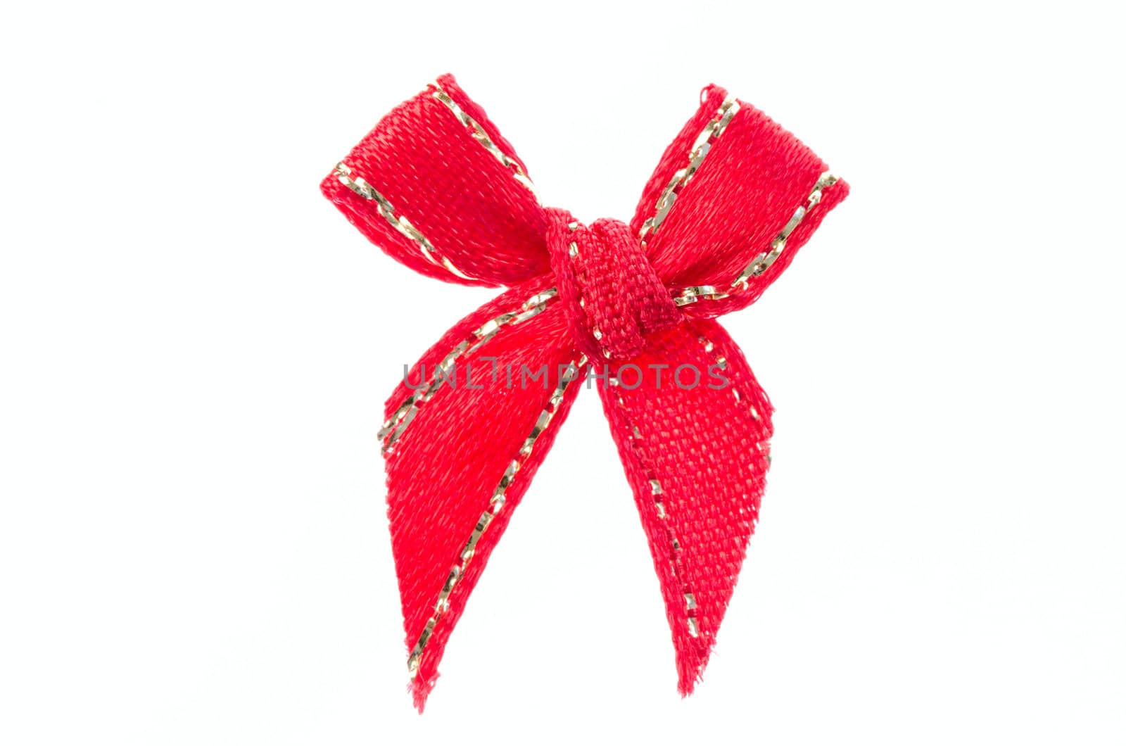 Red ribbon bow isolated on white background.