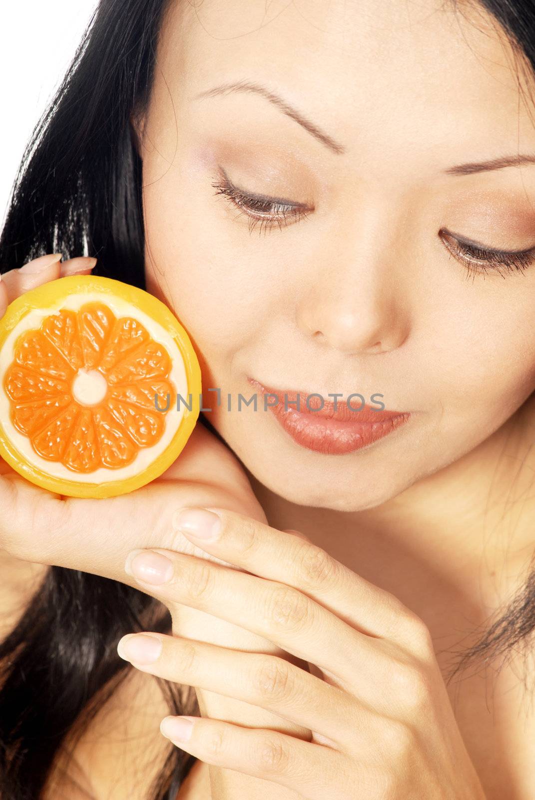 Close-up photo of pretty woman with fresh lemon