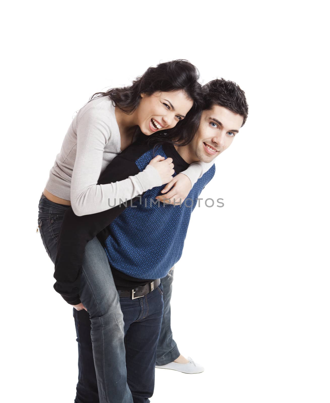Attractive and happy young couple isolated over a white background