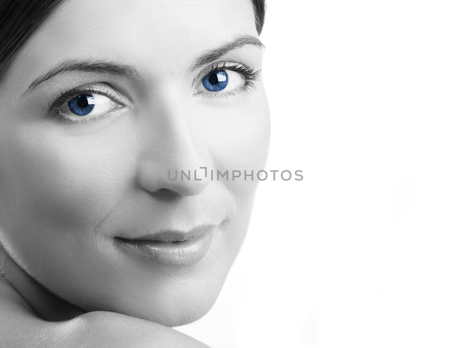 Close-up portrait of a beautiful and fresh woman isolated on white