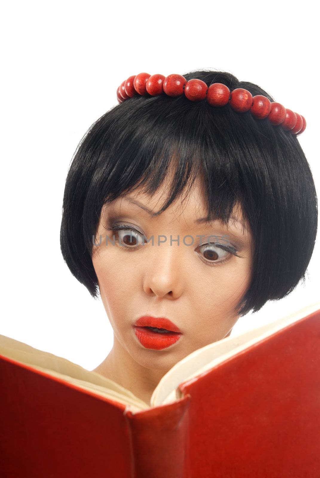 Emotional photo of the pretty model reading the red book