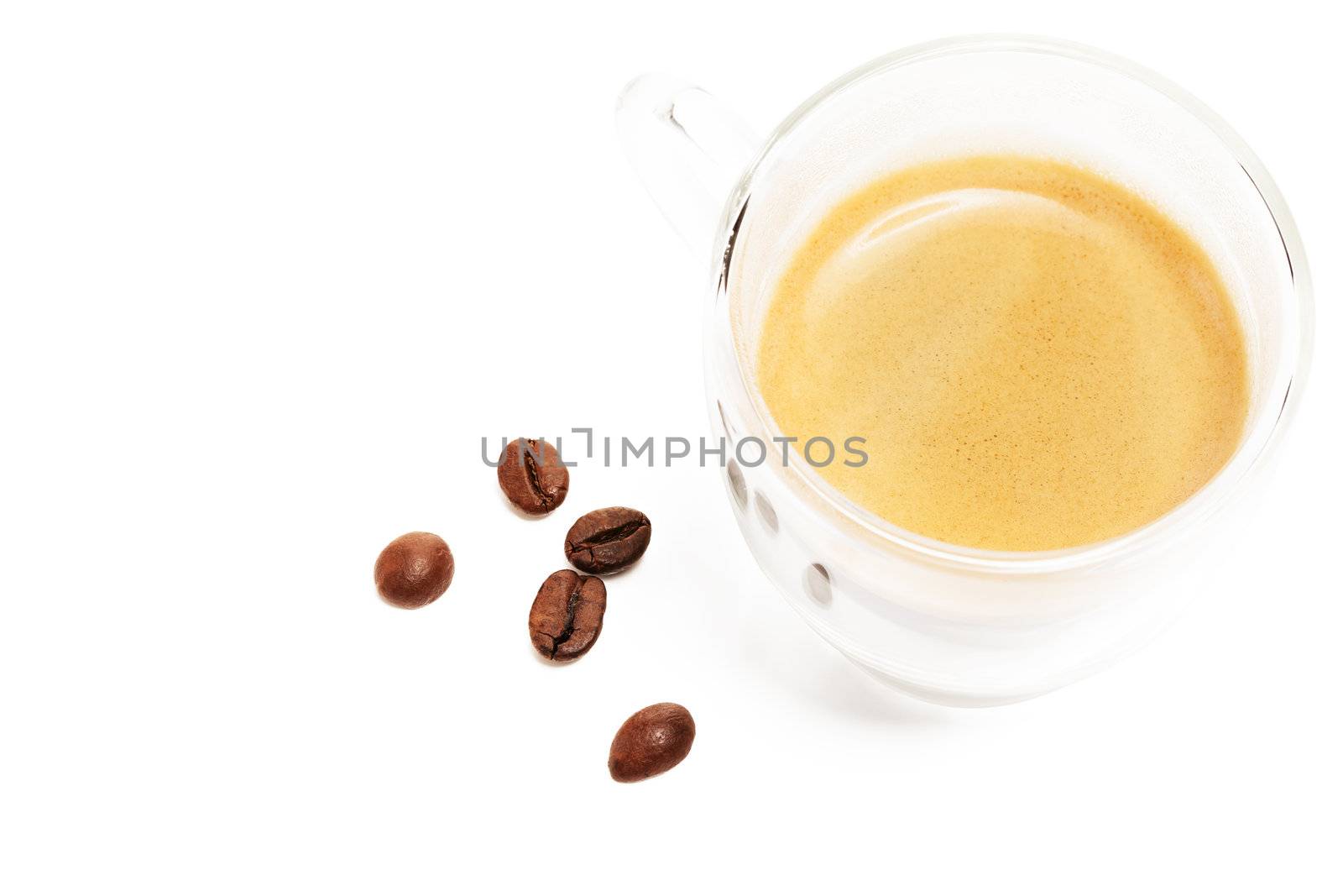 espresso closeup with coffee beans aside on white background