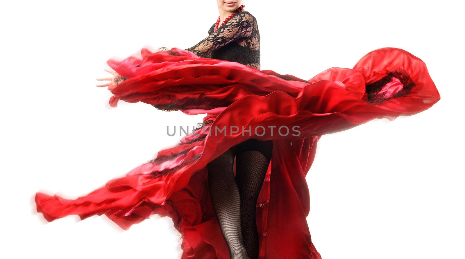 Elegant flamenco dancer with motion of her skirt