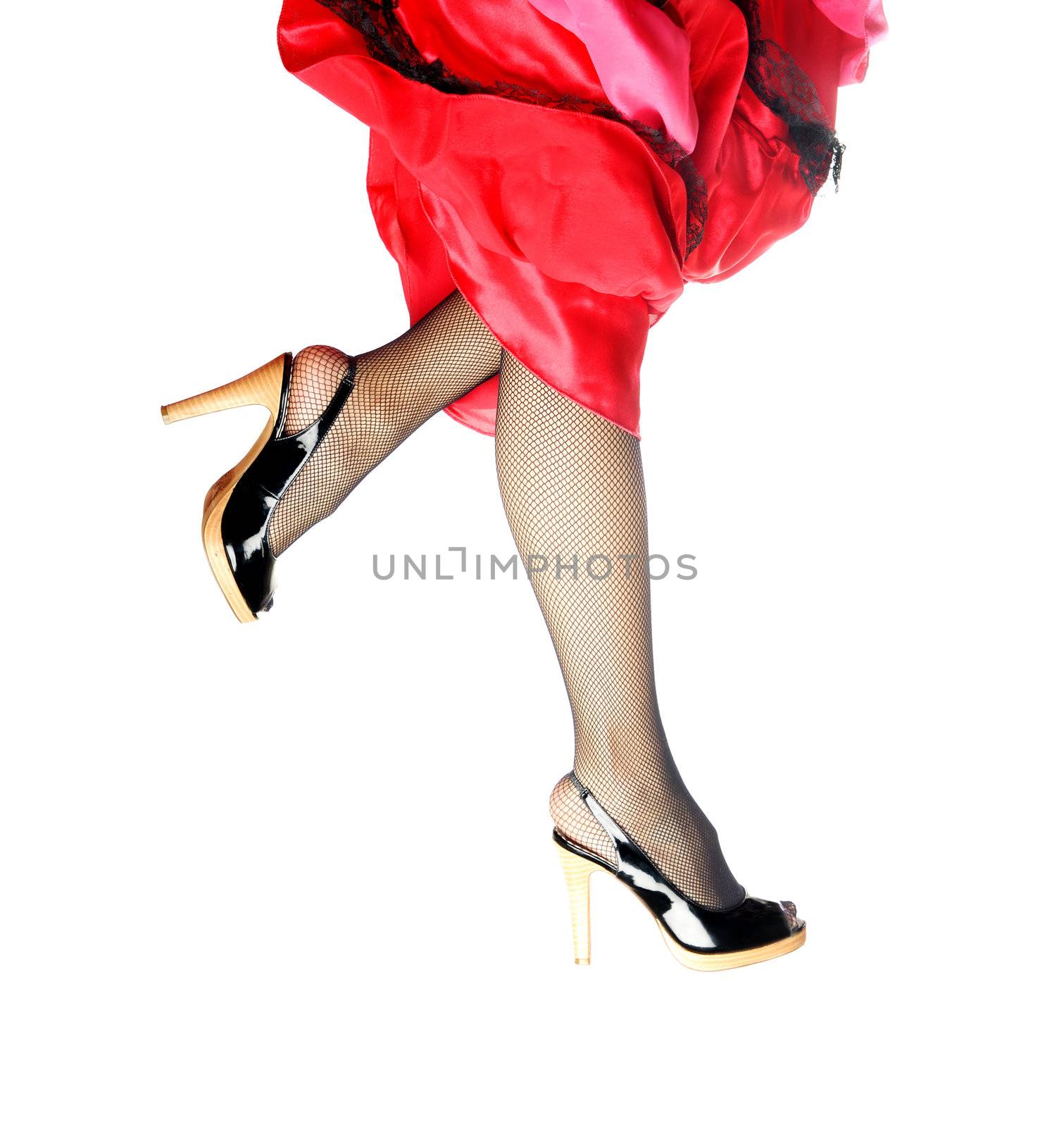 Woman legs running and dancing on a white background