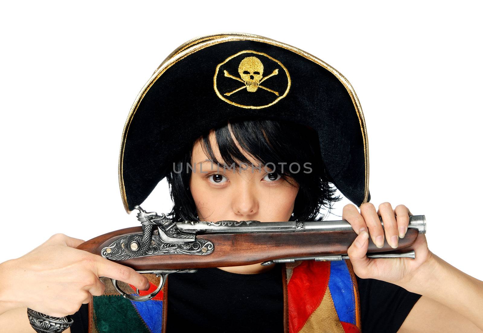 Woman in pirate costume with ancient pistol in hands