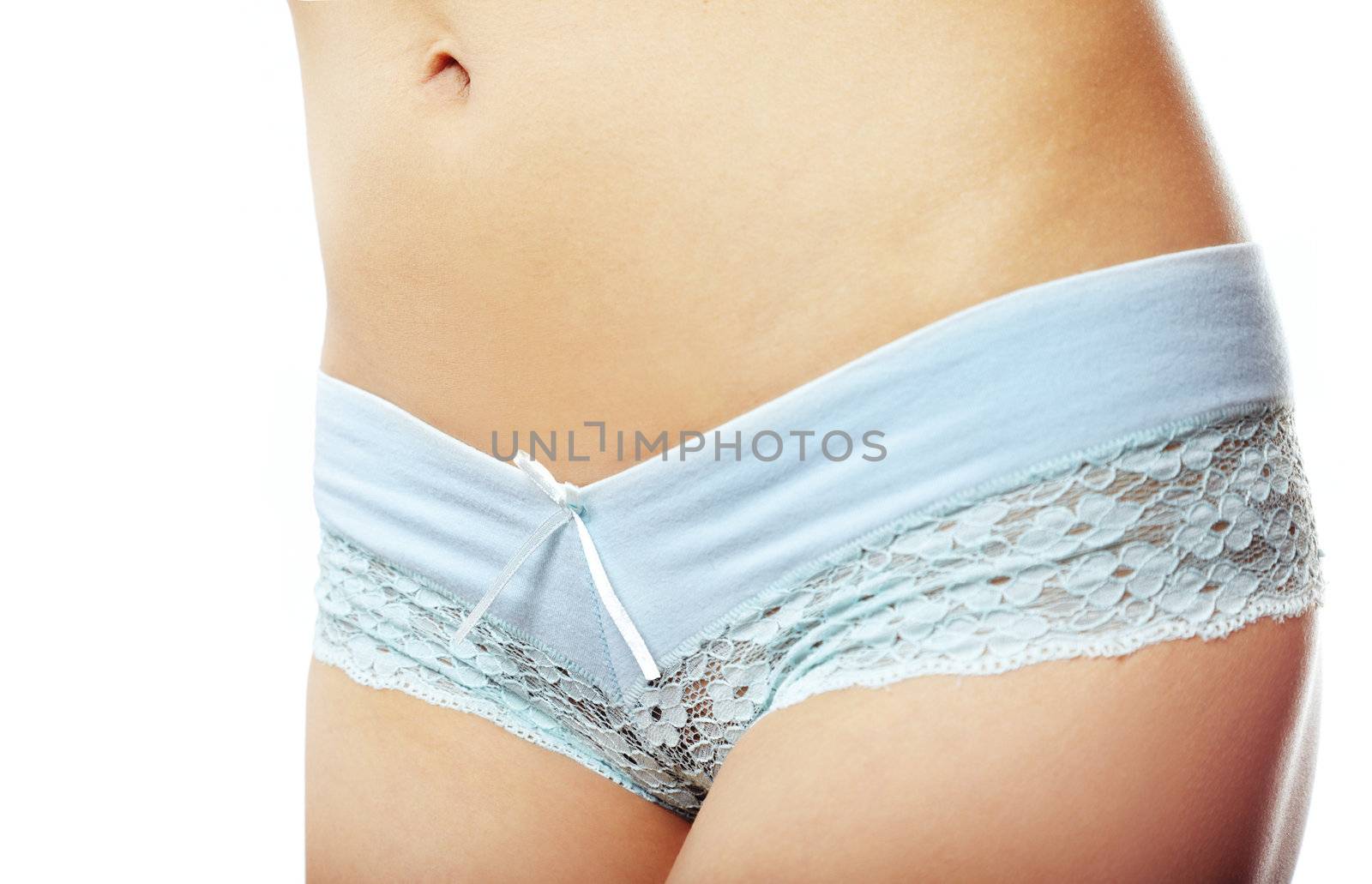 Woman waistline on a white background with blue panties