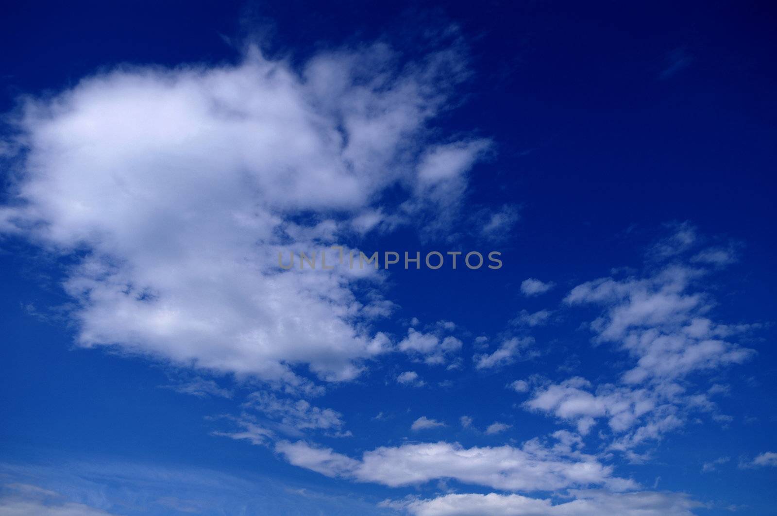 Blue sky and clouds background by Stoyanov