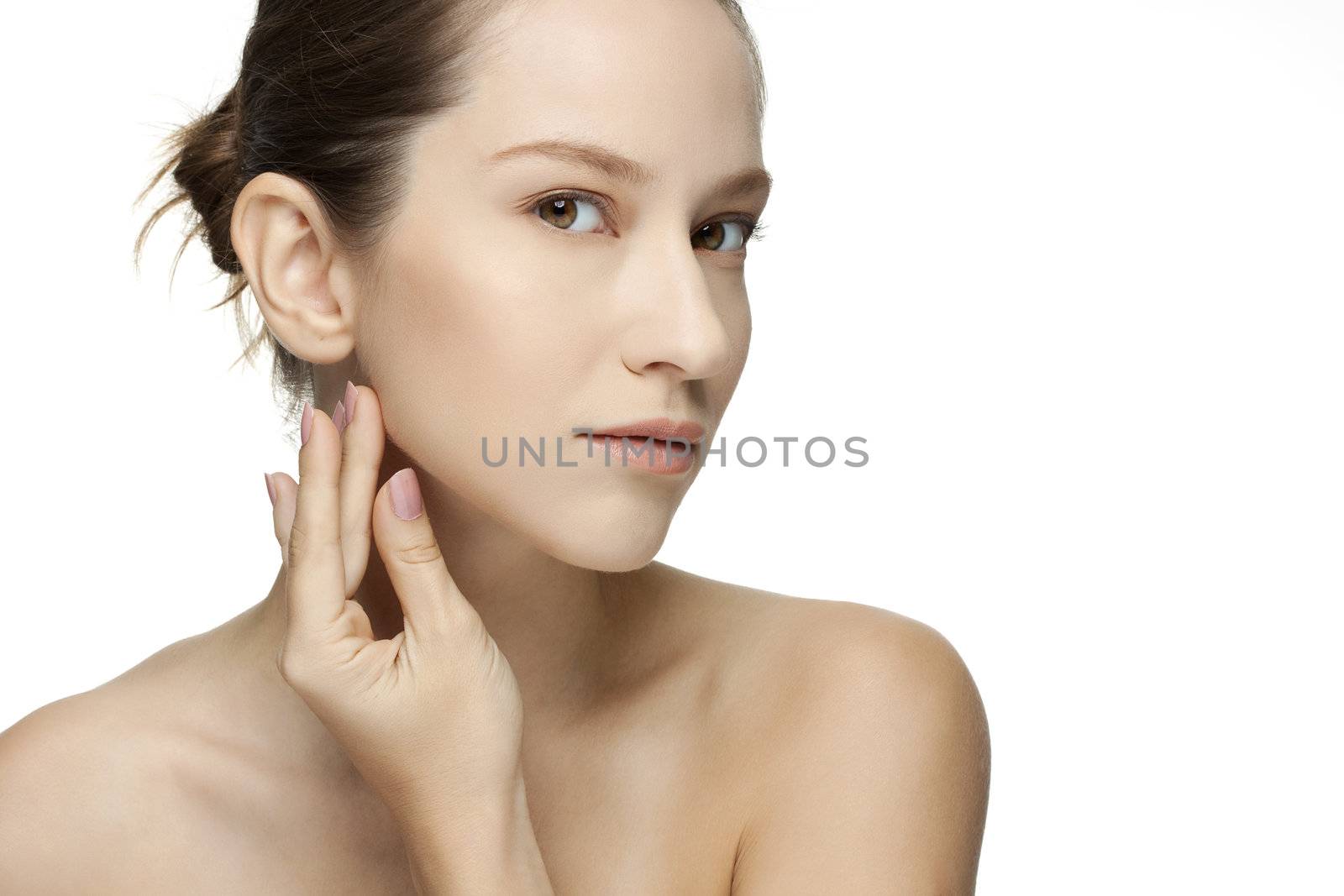 Beautiful Young Woman touching her Face. Skincare .Perfect Skin. Spa isolated on a white background