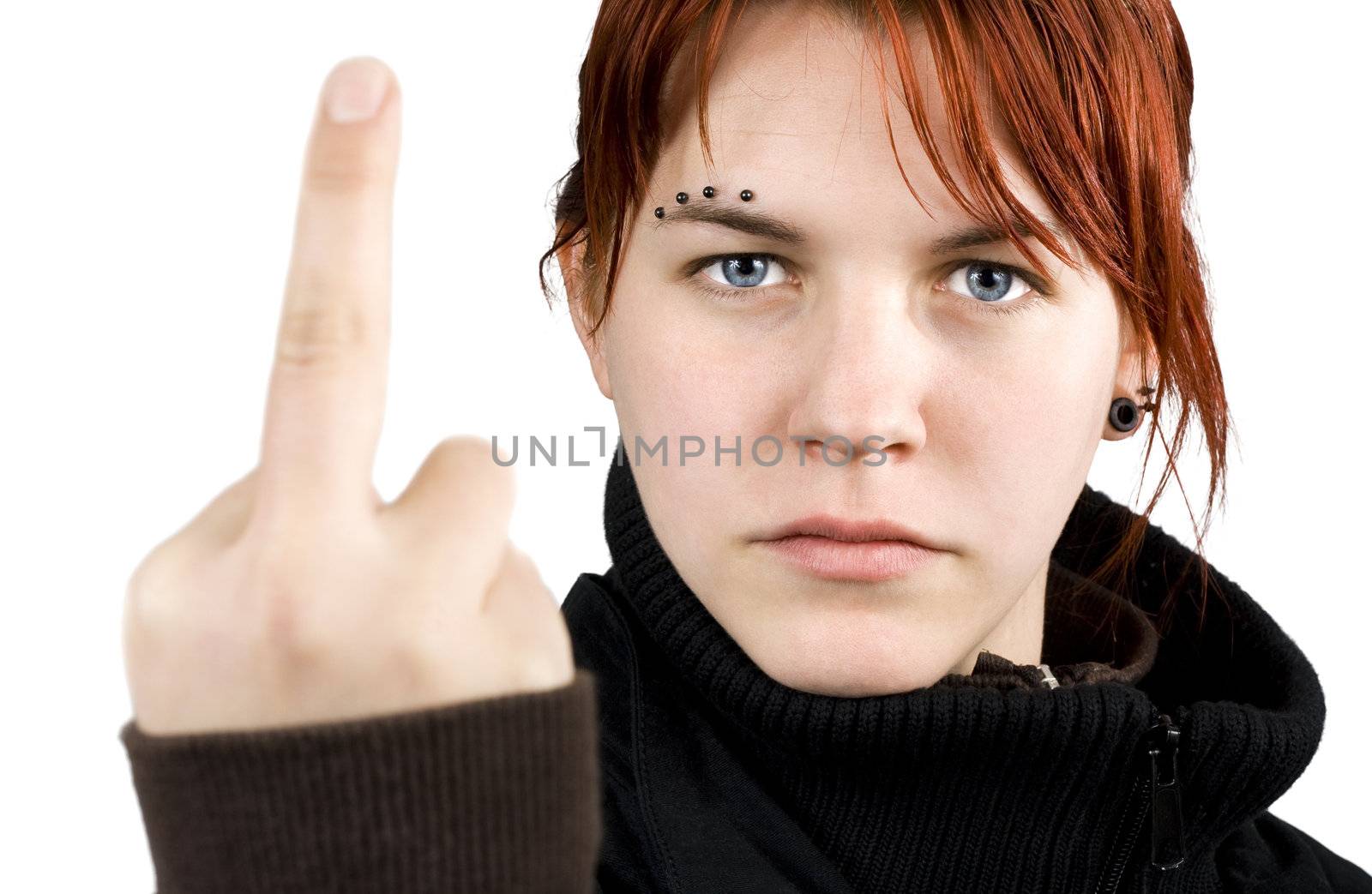 Angry redhead girl showing middle finger.